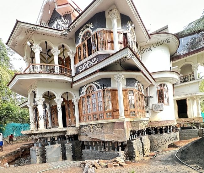 Synchronized jack system for house lifting